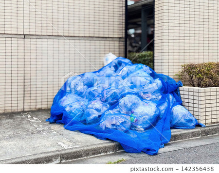 Images of garbage collection points that can be used to raise awareness of proper garbage disposal etiquette in apartment buildings and municipalities. Images of garbage collection points that can be used to raise awareness of proper garbage disposal etiquette in apartment buildings and municipalities. 142356438