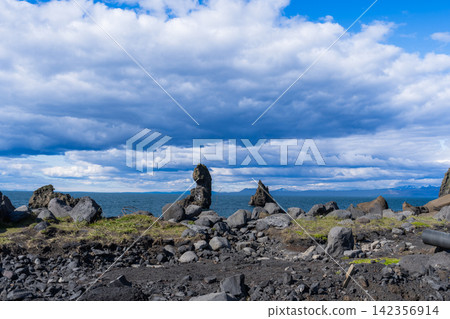Volcanic rock formations in Vestmannaeyjar, Iceland Volcanic rock formations in Vestmannaeyjar, Iceland 142356914