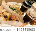Delicious-looking sandwiches and drinks 142356983