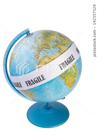 A globe is shown with a white band around its middle labeled with the word "FRAGILE" A globe is shown with a white band around its middle labeled with the word "FRAGILE" 142357329