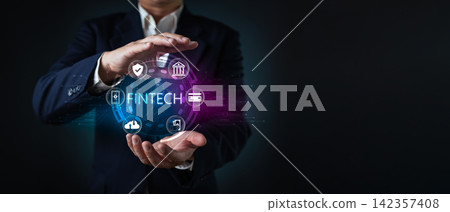 Businessman hands holding fintech hologram with banking icons. Financial technology concept for digital economy, global investment market and secure electronic money transaction system. Businessman hands holding fintech hologram with banking icons. Financial technology concept for digital economy, global investment market and secure electronic money transaction system. 142357408