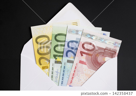 European money - Euro in a white envelope European money - Euro in a white envelope 142358437