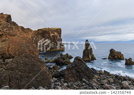 Valahnukamol cliffs on the Reykjanes Peninsula, Iceland, in flat evening light Valahnukamol cliffs on the Reykjanes Peninsula, Iceland, in flat evening light 142358749