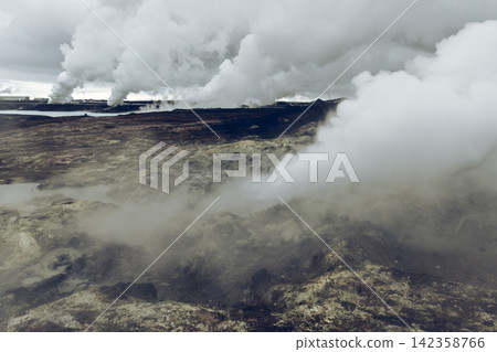 Gunnuhver geothermal field with muted steam and aged analog film color, Reykjanes, Iceland Gunnuhver geothermal field with muted steam and aged analog film color, Reykjanes, Iceland 142358766