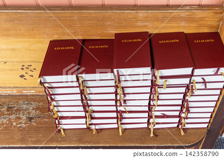Old church books at Strandarkirkja, Iceland, in soft ambient interior light Old church books at Strandarkirkja, Iceland, in soft ambient interior light 142358790