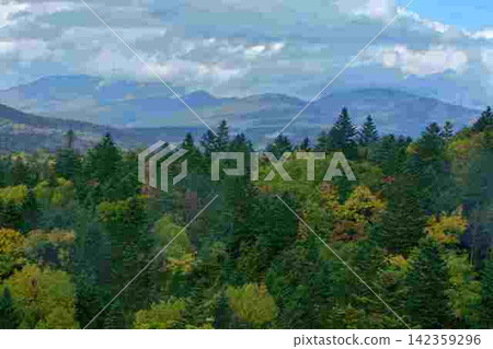 View of the foothills of Mt. Tokachi from Furano Jukai Pass View of the foothills of Mt. Tokachi from Furano Jukai Pass 142359296