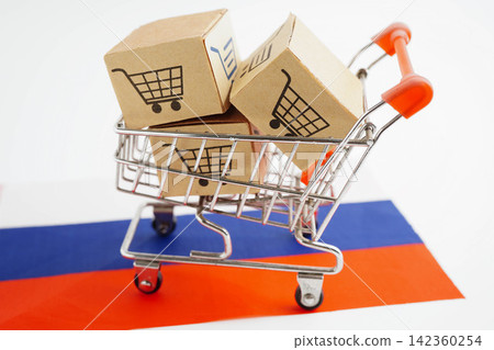 Online shopping, Shopping cart box on Russia flag, import export, finance commerce. Online shopping, Shopping cart box on Russia flag, import export, finance commerce. 142360254