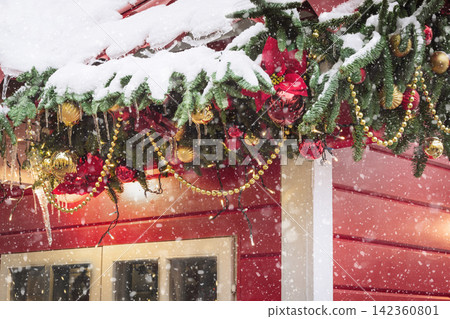 Traditional decorative red kiosk for workshop and sales handmade christmas gifts. Xmas decor. Decorated Christmas tree. Traditional decorative red kiosk for workshop and sales handmade christmas gifts. Xmas decor. Decorated Christmas tree. 142360801