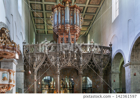 Organ inside Church of St. Pantaleon in Cologne Germany. Interior view of historic romanesque architecture heritage. Organ inside Church of St. Pantaleon in Cologne Germany. Interior view of historic romanesque architecture heritage. 142361597