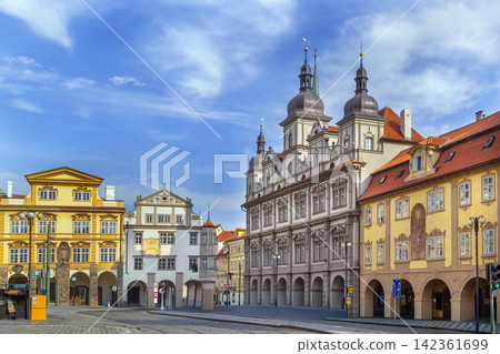 Malostranske Square in Prague city centre, Czech Republic. Historical baroque architecture under partly cloudy blue sky Malostranske Square in Prague city centre, Czech Republic. Historical baroque architecture under partly cloudy blue sky 142361699