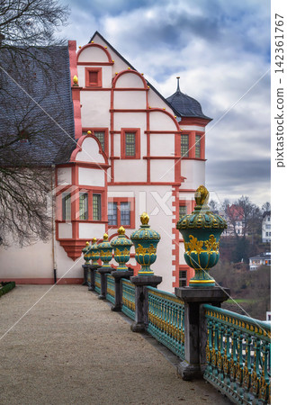 Balustrade on the observation terrace of Weilburg Castle, Germany. Historic palace architecture under cloudy sky, no people 142361767