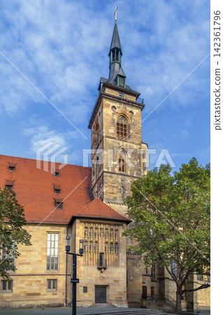 Bell tower of Stiftskirche church in Stuttgart, Germany. Gothic architecture of the historical landmark under cloudy sky Bell tower of Stiftskirche church in Stuttgart, Germany. Gothic architecture of the historical landmark under cloudy sky 142361796
