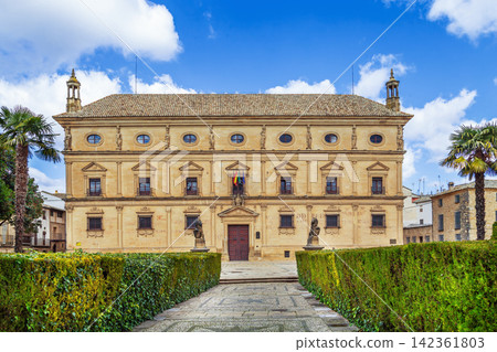 Facade of Vazquez de Molina Palace in Ubeda, Spain. Renaissance architecture under partly cloudy sky at daytime Facade of Vazquez de Molina Palace in Ubeda, Spain. Renaissance architecture under partly cloudy sky at daytime 142361803