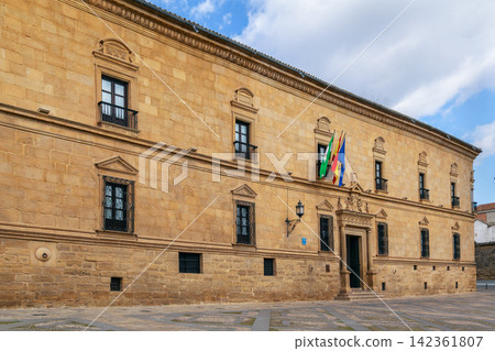 Facade of Dean Ortega Palace, now Parador hotel, in Ubeda, Spain. Renaissance architecture under cloudy sky at daytime Facade of Dean Ortega Palace, now Parador hotel, in Ubeda, Spain. Renaissance architecture under cloudy sky at daytime 142361807