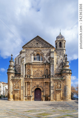 View of Holy Chapel of the Saviour from the square in Ubeda, Spain. Renaissance architecture under cloudy sky at daytime View of Holy Chapel of the Saviour from the square in Ubeda, Spain. Renaissance architecture under cloudy sky at daytime 142361808