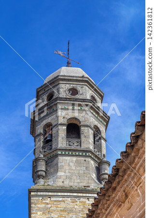 Bell tower of Baeza Cathedral in Jaen province, Spain. Renaissance and Gothic architecture under blue sky at daytime Bell tower of Baeza Cathedral in Jaen province, Spain. Renaissance and Gothic architecture under blue sky at daytime 142361812
