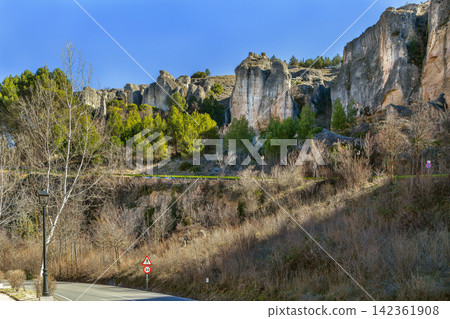 Scenic view of the limestone rocks near Cuenca, Spain, wide angle. Natural geological formations under sunny sky, no people Scenic view of the limestone rocks near Cuenca, Spain, wide angle. Natural geological formations under sunny sky, no people 142361908