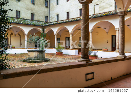San Francesco church in Pienza Italy view of the cloister. Gothic architecture with soft daylight on stone arches 142361967