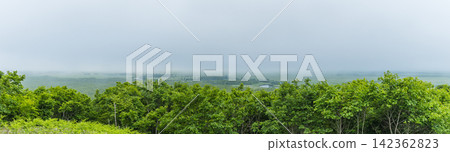 Japan, Hokkaido: Kushiro Marsh National Park, Kushiro Marshland as seen from the Kottaro Marshland Observatory, shrouded in mist. Japan, Hokkaido: Kushiro Marsh National Park, Kushiro Marshland as seen from the Kottaro Marshland Observatory, shrouded in mist. 142362823