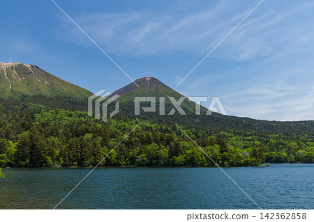 View of Mt. Meakan, Mt. Akan Fuji, and Lake Onneto from the Onneto observation deck in Ashoro Town, Hokkaido, Japan. View of Mt. Meakan, Mt. Akan Fuji, and Lake Onneto from the Onneto observation deck in Ashoro Town, Hokkaido, Japan. 142362858