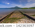Japan, Hokkaido, Kushiro City: A view of Lake Akan in its fresh greenery, Mount Oakan, and the lakeside railway. 142363097