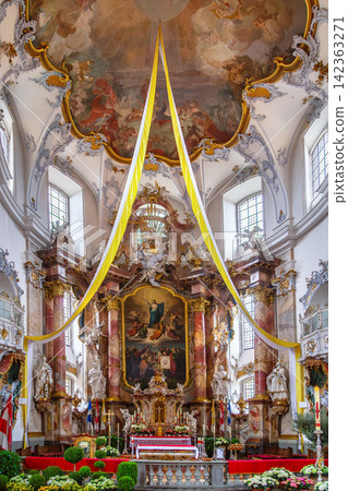 High altar inside the Basilica of the Fourteen Holy Helpers, Germany. Close-up view of the baroque sanctuary. Indoor light. High altar inside the Basilica of the Fourteen Holy Helpers, Germany. Close-up view of the baroque sanctuary. Indoor light. 142363271