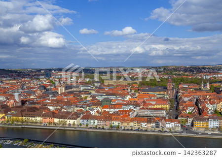 Panoramic view of historical center of Wurzburg from Marienberg Fortress Germany. Scenic old town cityscape under partly cloudy sky Panoramic view of historical center of Wurzburg from Marienberg Fortress Germany. Scenic old town cityscape under partly cloudy sky 142363287