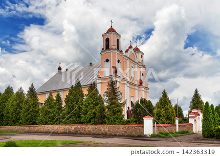 St John the Baptist church in Vasilishki, Belarus. Late baroque architecture style temple under partly cloudy sky St John the Baptist church in Vasilishki, Belarus. Late baroque architecture style temple under partly cloudy sky 142363319