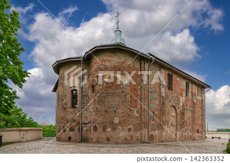 Apsidal view of Kalozha Church in Grodno, Belarus. Ancient Eastern Orthodox stone architecture landmark under daylight Apsidal view of Kalozha Church in Grodno, Belarus. Ancient Eastern Orthodox stone architecture landmark under daylight 142363352