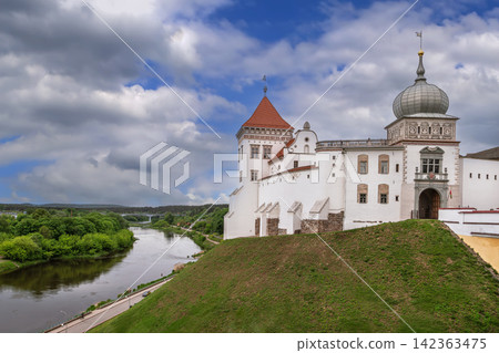 Old Castle on a hill by Neman River in Grodno, Belarus. Partly cloudy day, scenic panoramic historic landscape Old Castle on a hill by Neman River in Grodno, Belarus. Partly cloudy day, scenic panoramic historic landscape 142363475