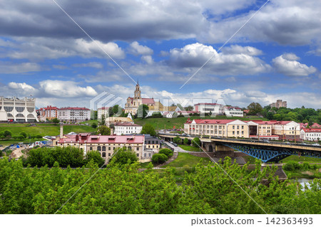 Grodno, Belarus city view with Bernardine Monastery and Drama Theatre. Partly cloudy day, historic modern contrast Grodno, Belarus city view with Bernardine Monastery and Drama Theatre. Partly cloudy day, historic modern contrast 142363493