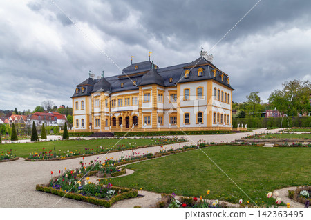 Veitshochheim Palace facade view in Veitshochheim, Germany. Exterior perspective of the historic building under an overcast sky Veitshochheim Palace facade view in Veitshochheim, Germany. Exterior perspective of the historic building under an overcast sky 142363495