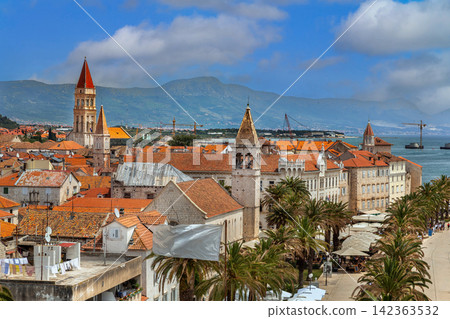 View of Trogir old town from Kamerlengo fortress, Croatia. High angle scenic cityscape under bright sunny sky 142363532