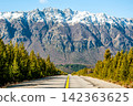 Scenic road trip highway leading towards snow capped Andes mountains in Patagonia, Argentina 142363625