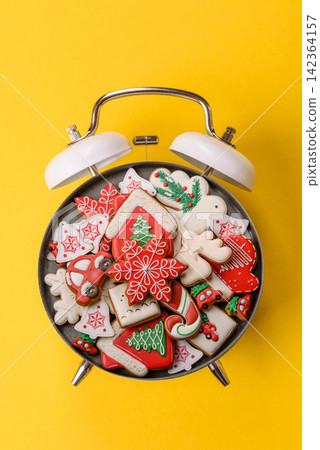 Gingerbread as a Christmas staple, sweet biscuits for the holiday. Gingerbread as a background Gingerbread as a Christmas staple, sweet biscuits for the holiday. Gingerbread as a background 142364157