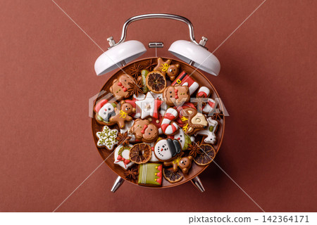 Gingerbread as a Christmas staple, sweet biscuits for the holiday. Gingerbread as a background Gingerbread as a Christmas staple, sweet biscuits for the holiday. Gingerbread as a background 142364171
