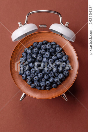 Fresh, ripe, and juicy wild blueberries as an ingredient for vegetarian dishes Fresh, ripe, and juicy wild blueberries as an ingredient for vegetarian dishes 142364184
