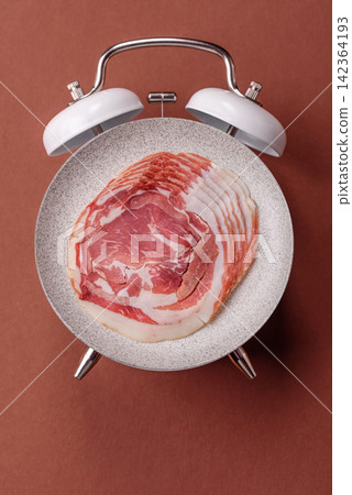 Slices of pork pancetta, ham, or bacon for a festive antipasto platter Slices of pork pancetta, ham, or bacon for a festive antipasto platter 142364193