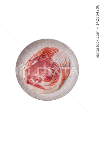 Slices of pork pancetta, ham, or bacon for a festive antipasto platter Slices of pork pancetta, ham, or bacon for a festive antipasto platter 142364206