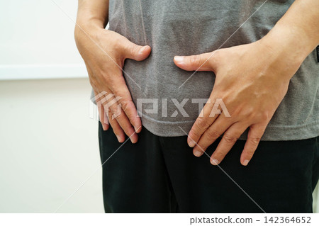 Hernia, Asian man stomach ache, abdominal pain and urology problem health. Hernia, Asian man stomach ache, abdominal pain and urology problem health. 142364652