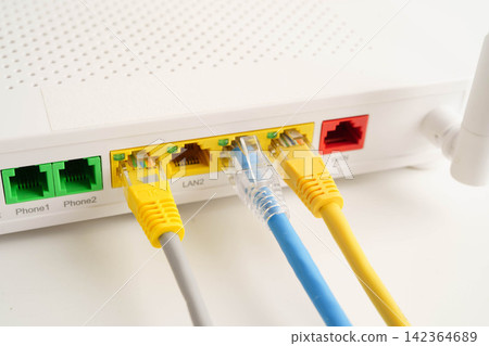 Ethernet cable with wireless router connect to internet service provider network. 142364689