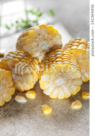 Fresh corn cobs cut ready for cooking Fresh corn cobs cut ready for cooking 142364956