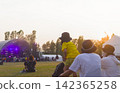 Sunset at an outdoor festival 142365258