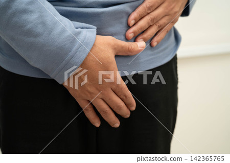 Hernia, Asian man stomach ache, abdominal pain and urology problem health. Hernia, Asian man stomach ache, abdominal pain and urology problem health. 142365765