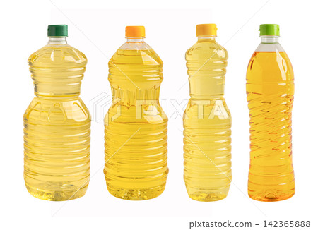 Vegetable oil in bottle isolated on white background. Vegetable oil in bottle isolated on white background. 142365888