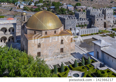 Top view of Ahmetiye Mosque with golden dome in Rabati Castle, Georgia. Historic Islamic fortress architecture Top view of Ahmetiye Mosque with golden dome in Rabati Castle, Georgia. Historic Islamic fortress architecture 142366217