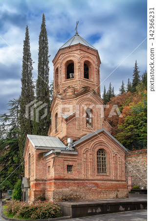 St Davids church facade on Mtatsminda in Tbilisi, Georgia. Front view, cloudy day with overcast sky, historic style St Davids church facade on Mtatsminda in Tbilisi, Georgia. Front view, cloudy day with overcast sky, historic style 142366231