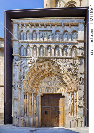 Portal of Church of Santa Maria in Sanguesa, Spain, close up view. Detailed medieval romanesque stone carving architecture Portal of Church of Santa Maria in Sanguesa, Spain, close up view. Detailed medieval romanesque stone carving architecture 142366564