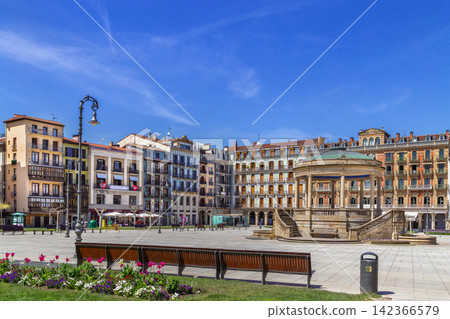 Castle Square view in Pamplona, Spain. Wide angle exterior view. Bright daylight with sunny blue sky. Historic plaza Castle Square view in Pamplona, Spain. Wide angle exterior view. Bright daylight with sunny blue sky. Historic plaza 142366579