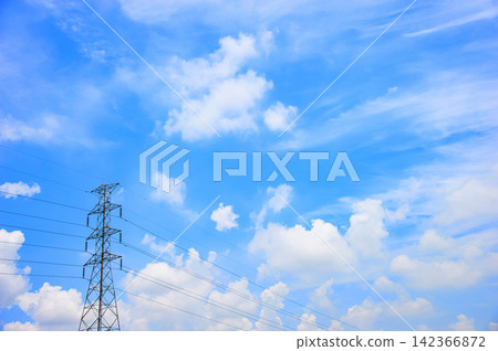 a big electric post with cloudy sky a big electric post with cloudy sky 142366872